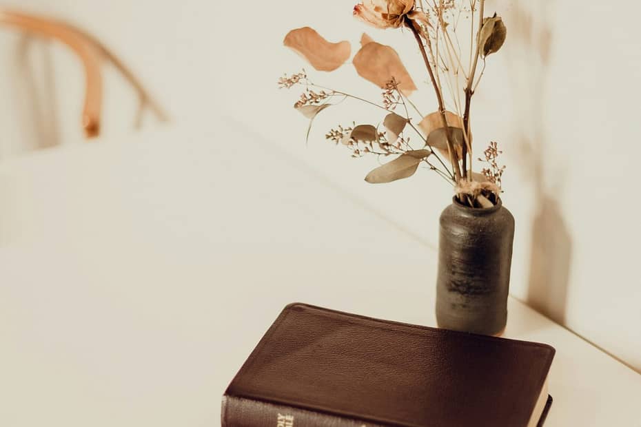 black hardbound book on white table